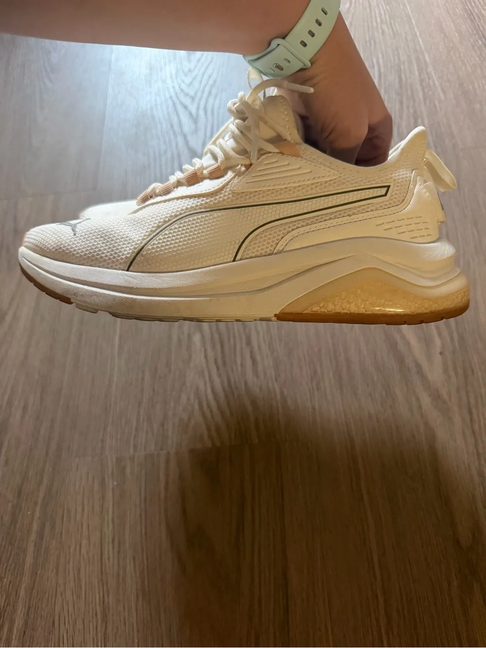 Puma women’s Off-White Cream Athletic Sneakers